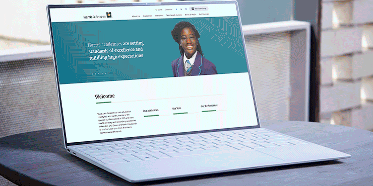This is a graphic of the harris federation website on a laptop. Best Multi Academy Trust of 2021